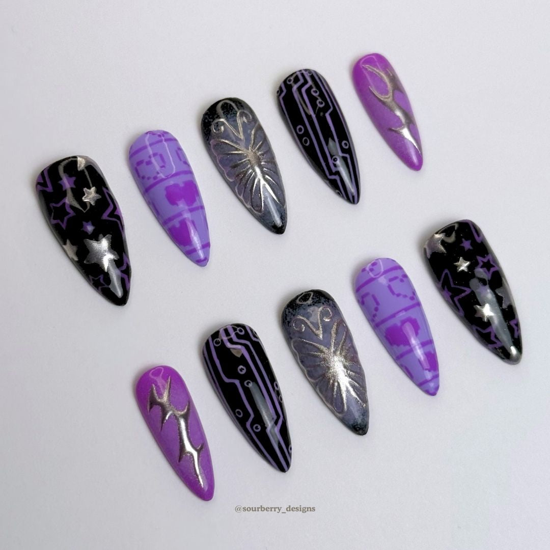 Another angle of the cyber butterfly nail set.