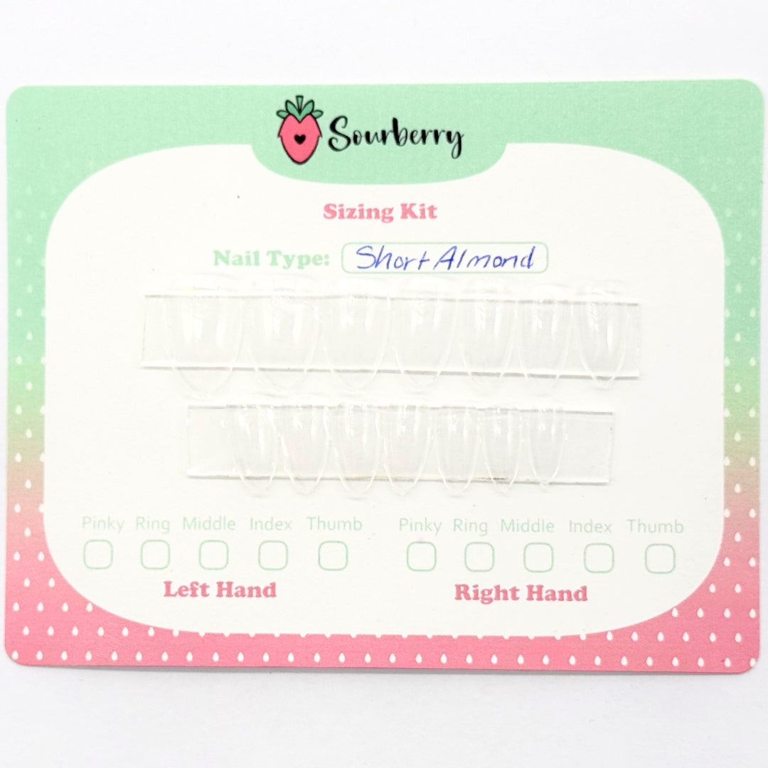 A picture of a sizing kit featuring 14 different sized clear press-ons mounted on a green and pink card. 